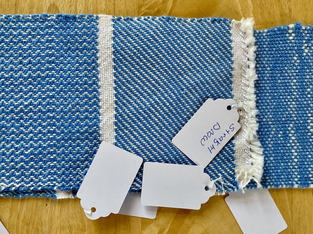 A sampler showing a variety of patterns that can be woven