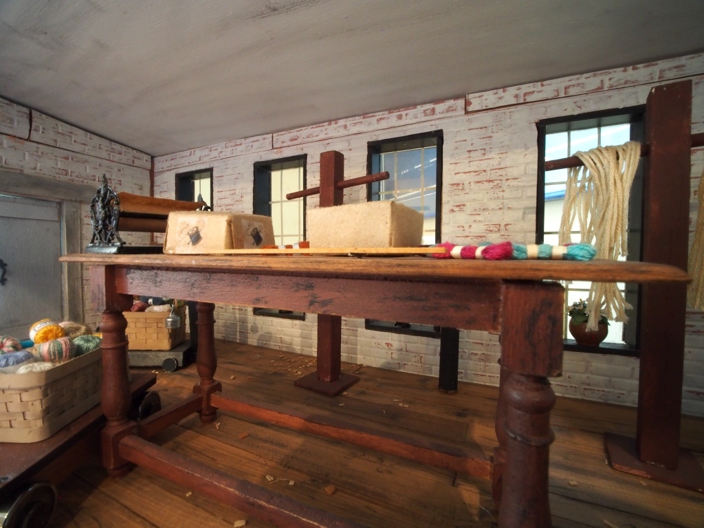 A view inside a model of a thread mill displayed as part of the Thread City permanent exhibit.